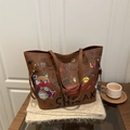 Brown faux leather tote bag with colorful hand-drawn graffiti and shoulder straps - Brown