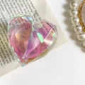 Soporte para móvil con corazón facetado 3D y degradado láser sobre fondo de libro vintage - Grande / Corazón Geométrico Láser Arcoiris