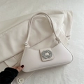 Elegant cream leather underarm baguette bag featuring a crystal rectangle buckle accent - White
