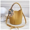 Mustard yellow lychee pattern bucket bag with silk scarf handle and long strap - Yellow