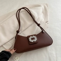 Dark brown leather baguette bag with a crystal buckle and minimalist tied shoulder strap - Brown