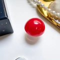Red mushroom style phone grip stand with glossy finish and clear collapsible base - Red