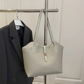 Pale green lychee texture tote bag with golden twist lock for daily commuting - Green