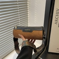 Brown frosted cylinder bag with retro patchwork design and colorful geometric strap - Brown