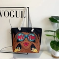 Classic black canvas tote bag featuring pop art cartoon print and white rope handles - Style 9