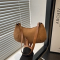 Brown suede half-moon baguette bag with matte texture and dual leather straps - Brown
