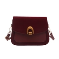 Vintage red crossbody flap bag with horseshoe gold buckle and mixed leather textures - Red