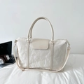 Grande borsa da viaggio bianco crema con trama a pieghe e tracolla regolabile versatile - Bianco