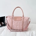 Grande borsa da viaggio rosa con trama plissettata, doppi manici e tracolla regolabile - Rosa