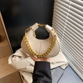Chic cream dumpling shoulder bag with glossy finish and bold chunky gold chain - Khaki