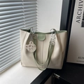 Minimalist beige PU leather tote bag with green accents and tiger charm for women - Khaki