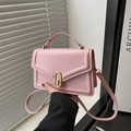 Minimalist light pink crossbody bag with gold buckle and top handle for women - Pink