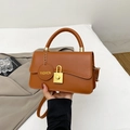 Caramel brown leather shoulder bag with golden square lock and fashion charm - Brown