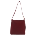 Minimalist burgundy bucket bag with adjustable shoulder strap on a white background - Red