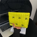 Pochette gialla trapuntata con fiocchi ricamati e zip per l'uso quotidiano casuale - Giallo