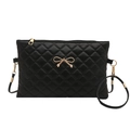 Black quilted faux leather clutch bag featuring a gold bow accent and wristlet strap - Black