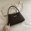 Vintage dark brown shoulder bag with all-over M-print pattern and golden bar detail - Brown