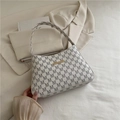 Chic off-white hobo bag with vintage monogram patterns and elegant gold hardware - White