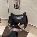 Chic black patent leather crescent shoulder bag with geometric woven strap for women - Black