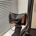 Fashionable black matte leather handbag with floral metal chain and brown strap - Black