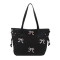 Borsa tote nera imbottita con ricami a fiocco colorati e trama trapuntata trendy - Nero