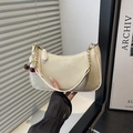 Chic beige shoulder bag with gold chain strap and red cherry charm decoration - White