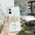 Detailed shot of iPhone case with real dried flowers, white silk bow, and glitter stars - Real Flower Epoxy - White / iPhone 17 Pro Max