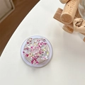 Close-up of a pink cherry blossom phone grip with sparkly sequins and resin flower - Magnetic Colorful Sequin Cherry Blossom No. 7