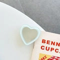 Dettaglio ravvicinato di uno specchio a cuore per telefono color verde menta - Supporto Trasparente-Specchio a Cuore con Bordo Jelly-Verde Menta
