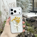 Detail showing transparent iPhone case with yellow dried flowers and a silk bow - Real Flower Epoxy - Yellow / iPhone 17 Pro Max