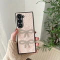 Detail of pink faux crocodile leather phone case with dual rhinestone bow decorations - Pink Snakeskin Rhinestone Butterfly / Samsung ZFlip3