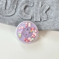 Detailed macro view of a purple glitter button phone grip with colorful fruit slice inserts - Magnetic Pearly Fruit Button - Purple
