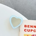 Macro detail of a light blue heart-shaped mirror phone grip on a white surface - Transparent Bracket-Jelly Edge Heart Mirror-Blue