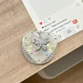 Detailed macro view of heart-shaped phone grip with iridescent finish and crystal butterfly - (White Diamond) Magnetic Shell Heart - #9 Colorful Butterfly