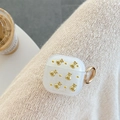 Dettaglio custodia AirPods glitterata con sacchetti d'oro 3D e anello di aggancio - Ciondolo Borsa della Fortuna Dorata / 1ª/2ª Gen Universale