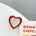 Detail shot of a red heart-shaped phone grip and makeup mirror on a white desk - Transparent Bracket-Jelly Edge Heart Mirror-Brown