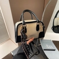 Fashionable black and white contrast Boston bag with woven tassel and adjustable strap - White & Black (With Charm)