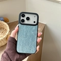 Close-up of light blue luxury wrinkled leather texture on iPhone protective case back - Pearlescent Blue / iPhone 17 Pro Max
