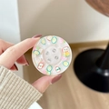Detail der Handyhalterung aus Glitzerharz mit bunten Fruchtmustern am Knopf - Fruchtperle - Rosa