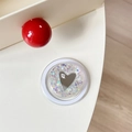 Detail of round phone socket with heart mirror and colorful glitter in white - Magnetic Sequin Heart Mirror Style 14