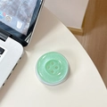 Glittering light green button phone grip stand on desk with laptop background - Magnetic-Pearly Big Button / Dark Green