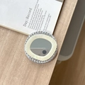 Detalle del soporte magnético para móvil con diamantes de imitación y espejo ondulado - Espejo de Abanico con Textura de Concha / Blanco Roto