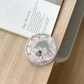 Detailed view of a rhinestone-encrusted dolphin phone grip with pearl texture finish - Rendered Block Dolphin Mirror / Purple White