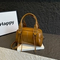 Deep mustard yellow Boston handbag with lace-up eyelets and detachable shoulder strap - Brown