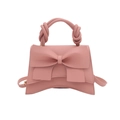 Bolso de mano rosa minimalista con lazo grande y asa trenzada para mujeres - Rosa
