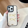 Close-up of beige woven leather iPhone case with double bows and metal text detail - Off-white