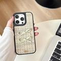 Detail of tweed texture phone case with bows and gold plate for iPhone 16 Pro Max - Khaki