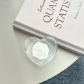 Macro view of transparent heart phone socket with a 3D white rose flower model - 3D Heart Stand - Bowknot Series - No. 10