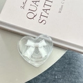 Detailed view of heart-shaped transparent phone grip with white bow and silver edges - 3D Heart Stand - Bowknot Series - No. 14 White