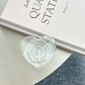 Macro detail of clear heart phone grip with an iridescent butterfly insert design - 3D Heart Stand - Bowknot Series - No. 15